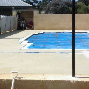 exposed aggregate pool surround in collie