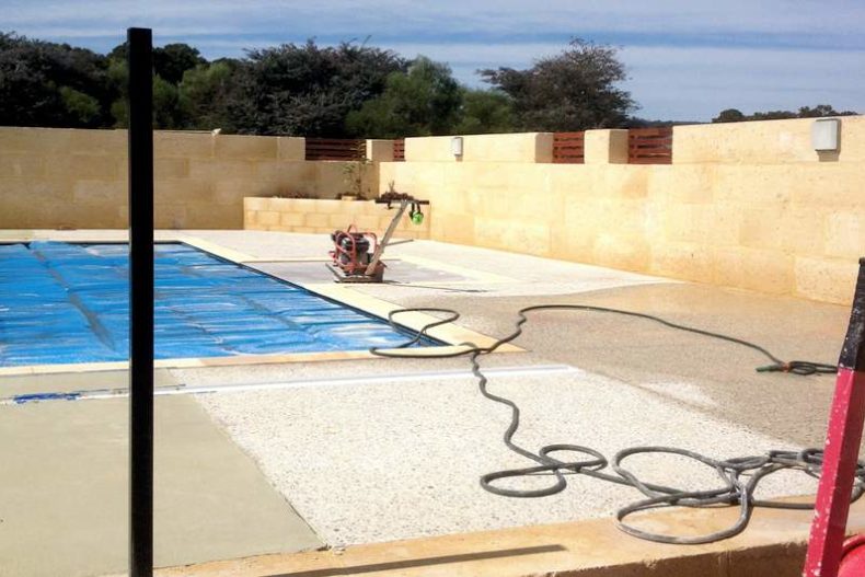 exposed aggregate pool surround in harvey